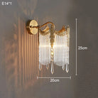 Gold crystal wall sconce, round backplate with arched crown and hanging crystal drops