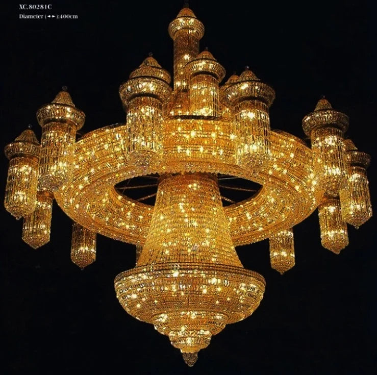 Gold crystal chandelier with wide circular ring and central pendant, sparkling crystal strands