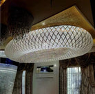 Oval crystal chandelier with white mesh frame and vertical hanging bead strands