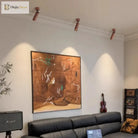 Walnut wood-grain LED spotlights installed on ceiling with a sofa and wall art nearby
