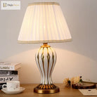Antique ceramic LED desk lamp with white fabric shade and cream-and-gold base