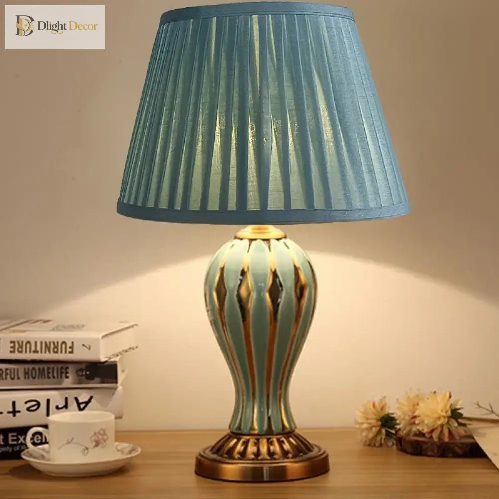 Antique ceramic LED desk lamp with teal fabric shade and teal-and-gold base