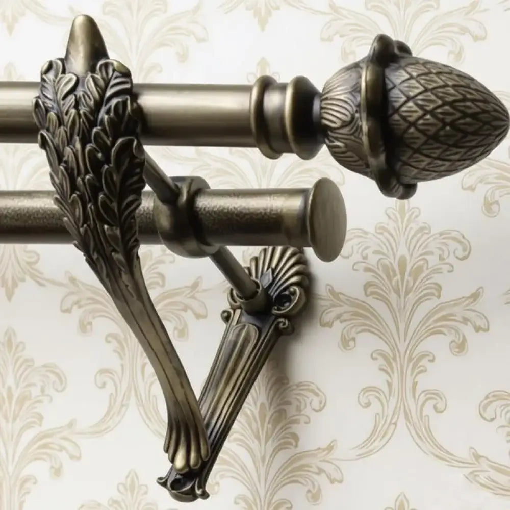 Antique gold double bracket set with leaf carving and decorative end caps