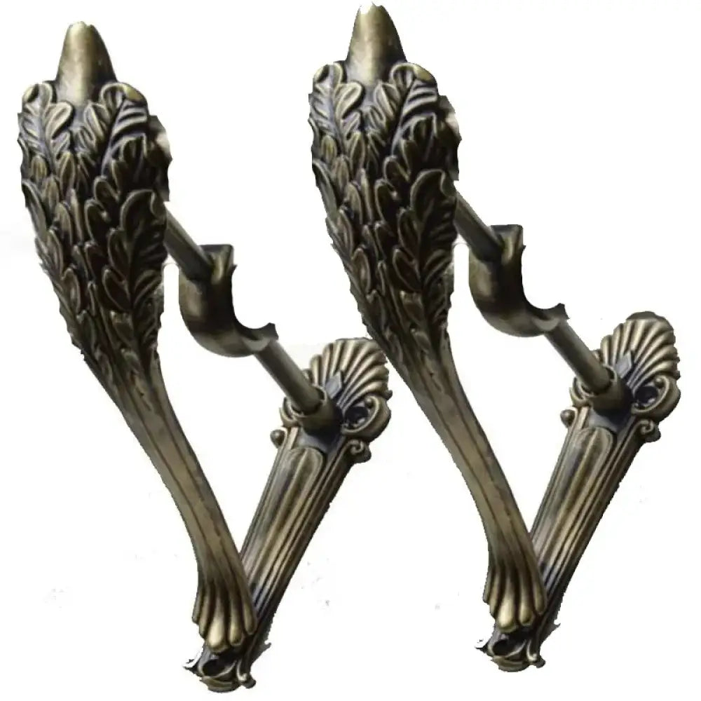 Antique gold carved curtain rod brackets, two-piece leaf design with scroll detailing