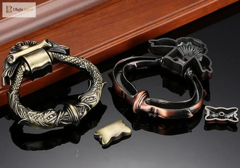 Antique door knocker set with gold and bronze wreath frames plus small mounting hardware