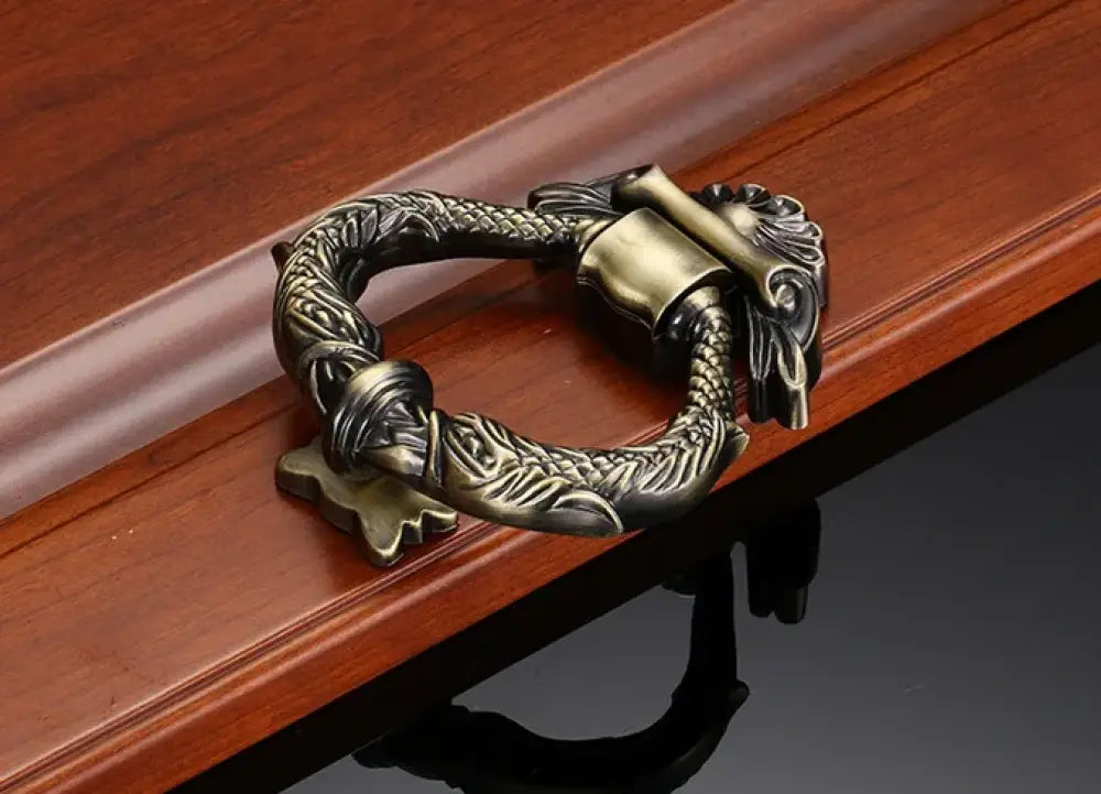Antique gold zinc alloy door knocker wreath ring with ornate vine and leaf details