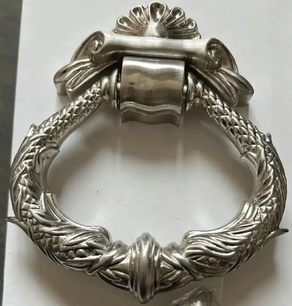 Antique silver zinc alloy door knocker wreath ring with central housing and leaf accents