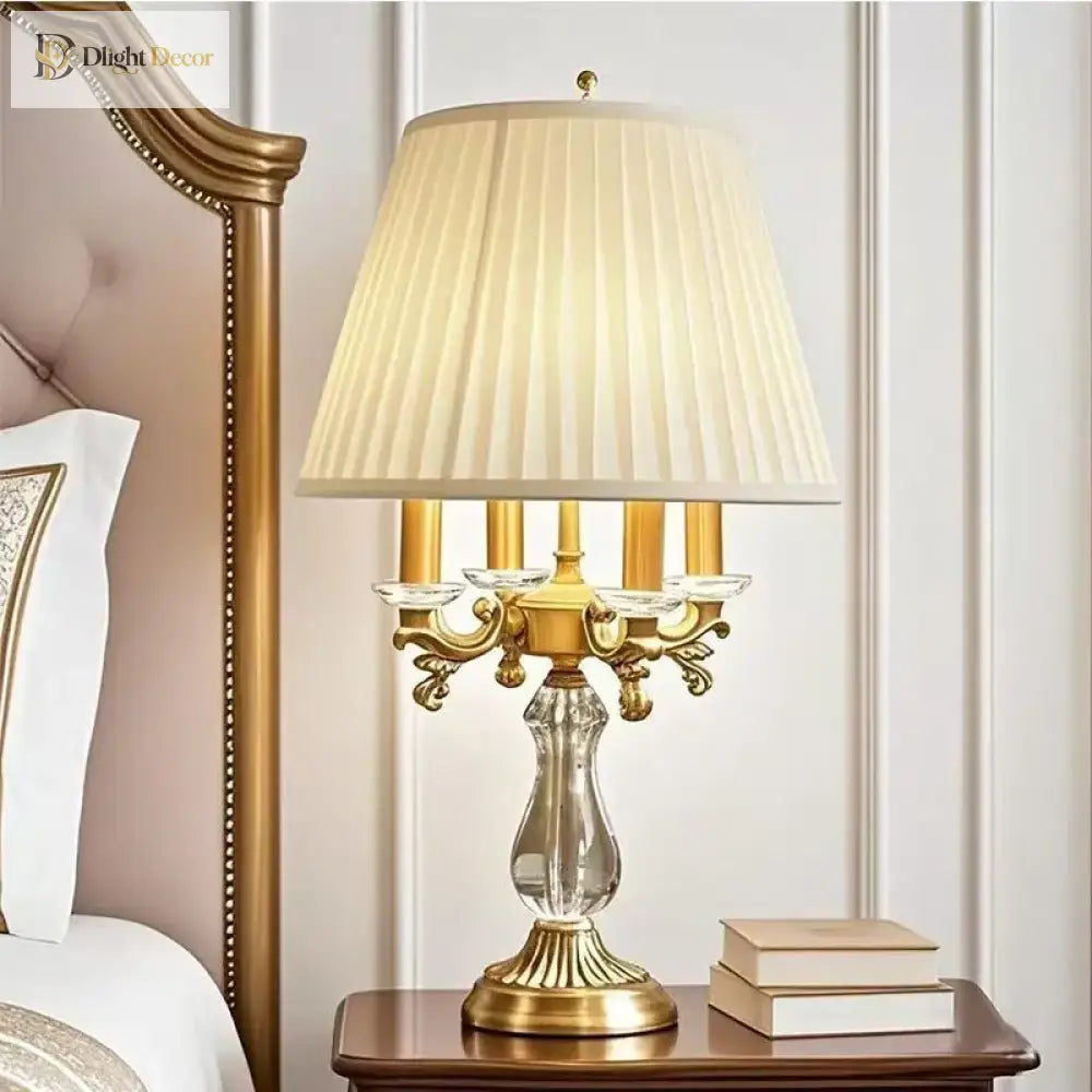 Gold art deco desk lamp with pleated cream shade and clear fluted crystal stem