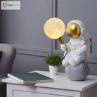 Astronaut Moon Table Lamp, a tiny spaceman a glowing moon and a whole lot of charm 🚀🌕✨ - Table Lamp
