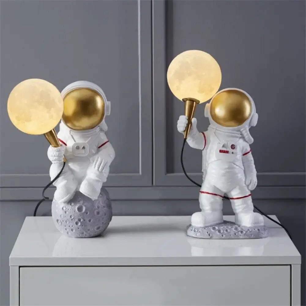 Astronaut Moon Table Lamp, a tiny spaceman a glowing moon and a whole lot of charm 🚀🌕✨ - Table Lamp