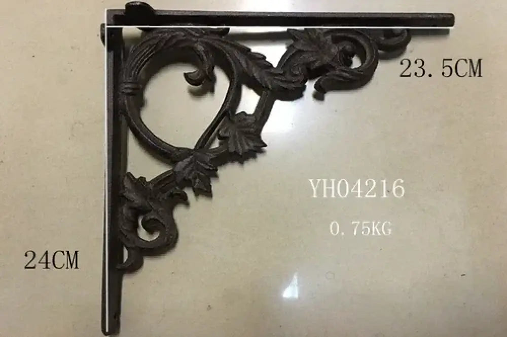 Cast iron right-angle shelf bracket with floral scroll corner, dark finish