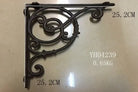 Cast iron right-angle shelf bracket with heart-and-scroll ornament, dark finish