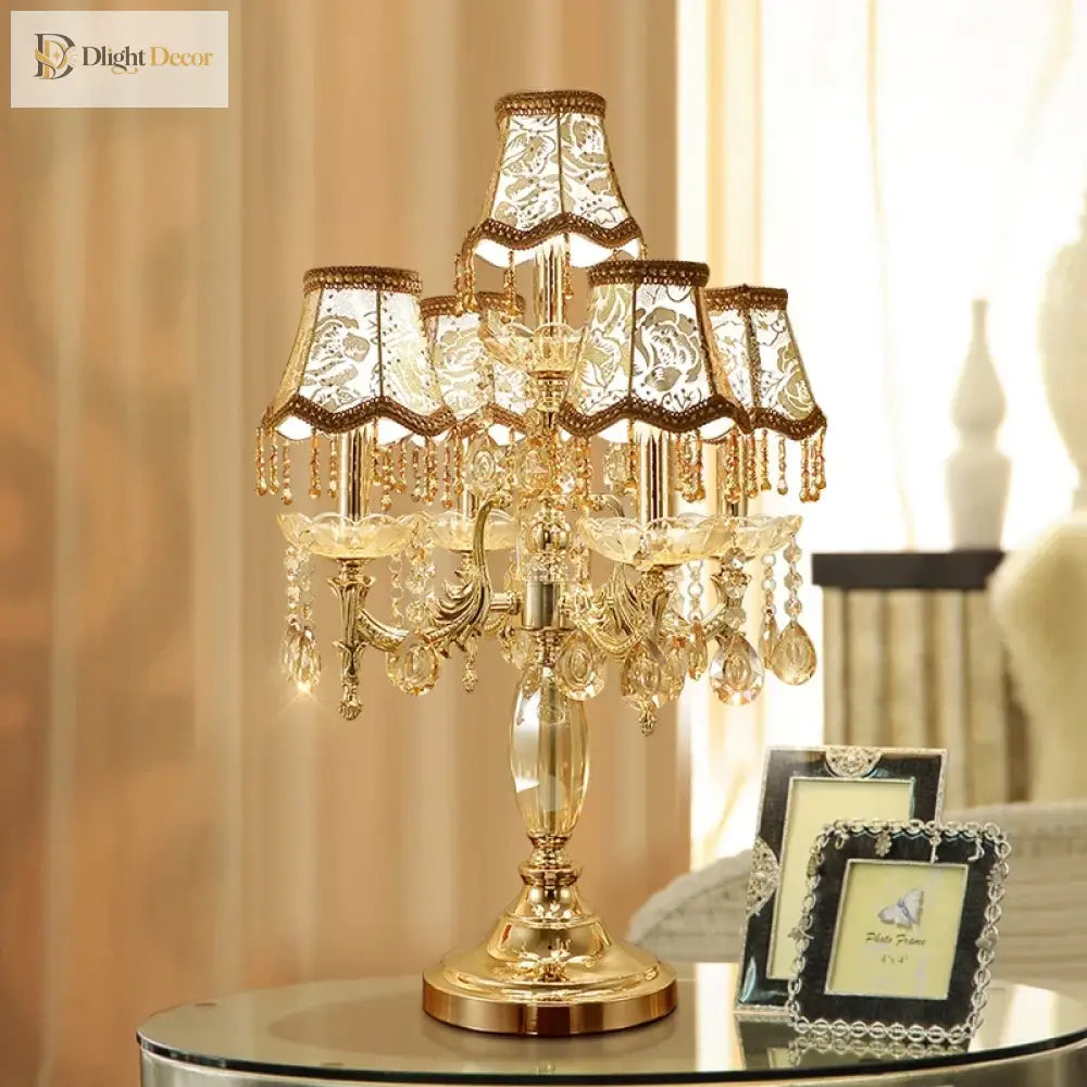 Gold crystal LED desk lamp with multi-shade chandelier-style base and dangling crystal drops