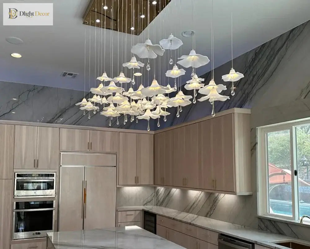 Mushroom ceramic chandelier with many glowing white caps hanging from the ceiling
