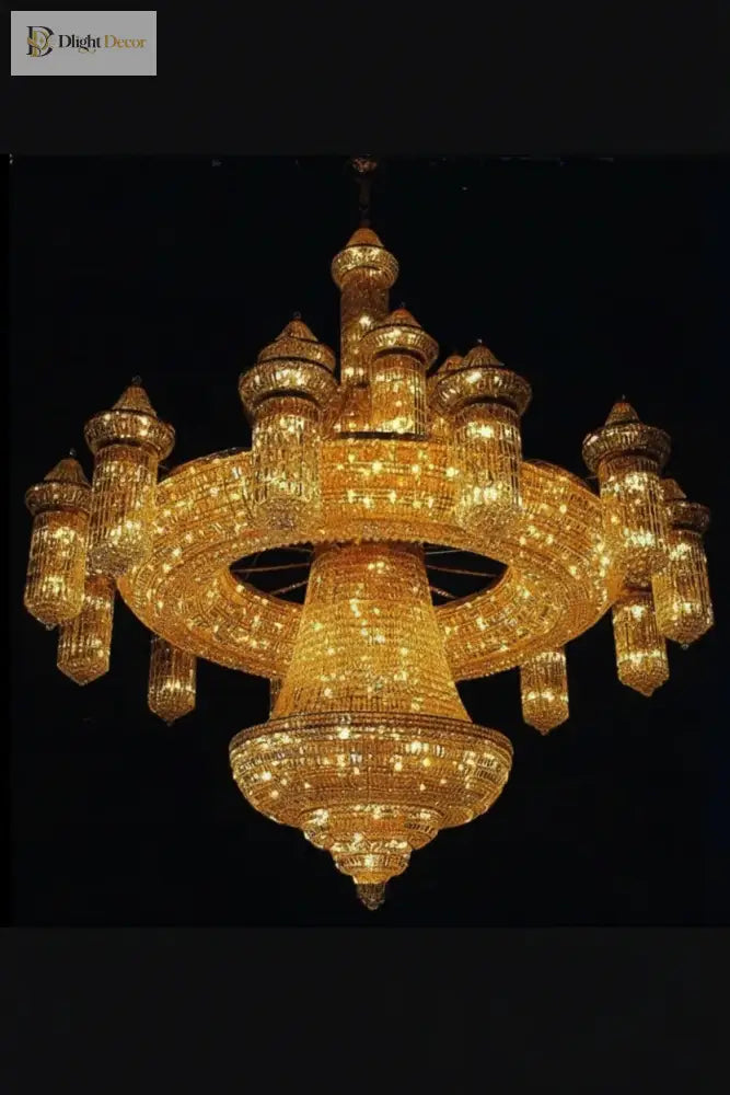 Gold crystal chandelier with tiered ring arms and sparkling strands, central pendant