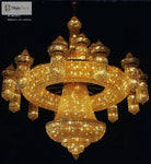 Gold crystal chandelier with domed tiers, hanging crystal lanterns, circular ring center