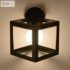 Cyrus - Industrial Chic Wall Sconce With Black Metal Cage