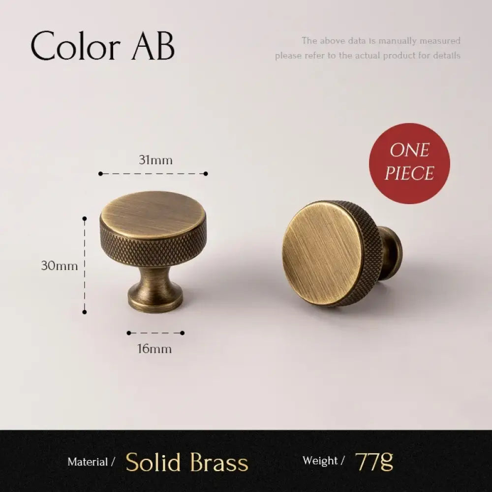 Antique brass cabinet handle with cross-knurled round knob, solid brass construction.