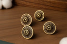 Floral cabinet knob handle, brushed brass round face