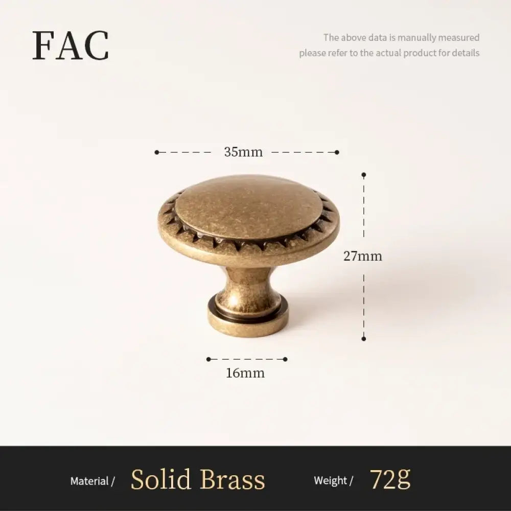 Antique brass cabinet knob with domed top and starburst edge, 35mm