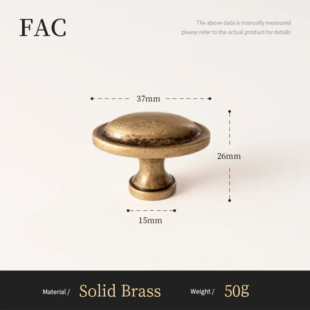 Antique brass cabinet knob with textured domed top and round base, 37mm