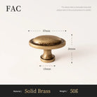 Antique brass cabinet knob with textured domed top and round base, 37mm