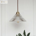 Enhance Your Dining Room With Industrial Elegance: The Brass Cone Pendant Clear Ribbed Glass