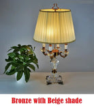 Bronze-tone fabric LED desk lamp with beige shade and crystal base