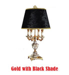 Gold-tone fabric LED desk lamp with black shade and crystal base