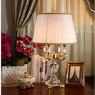 Modern fabric LED desk lamp with beige pleated shade and gold-tone base