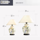 Two-size ceramic table lamp with white shades, blue bird motif shown with measurements