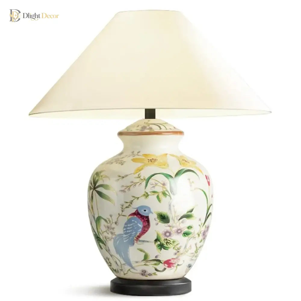 Ceramic vase table lamp with white shade, blue bird and botanical pattern