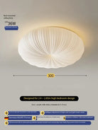 Cream ribbed fabric flush-mount ceiling light with round dome shade