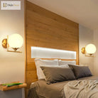 Modern Elegance Meets Warmth: Gold Sphere Bedside Wall Sconce