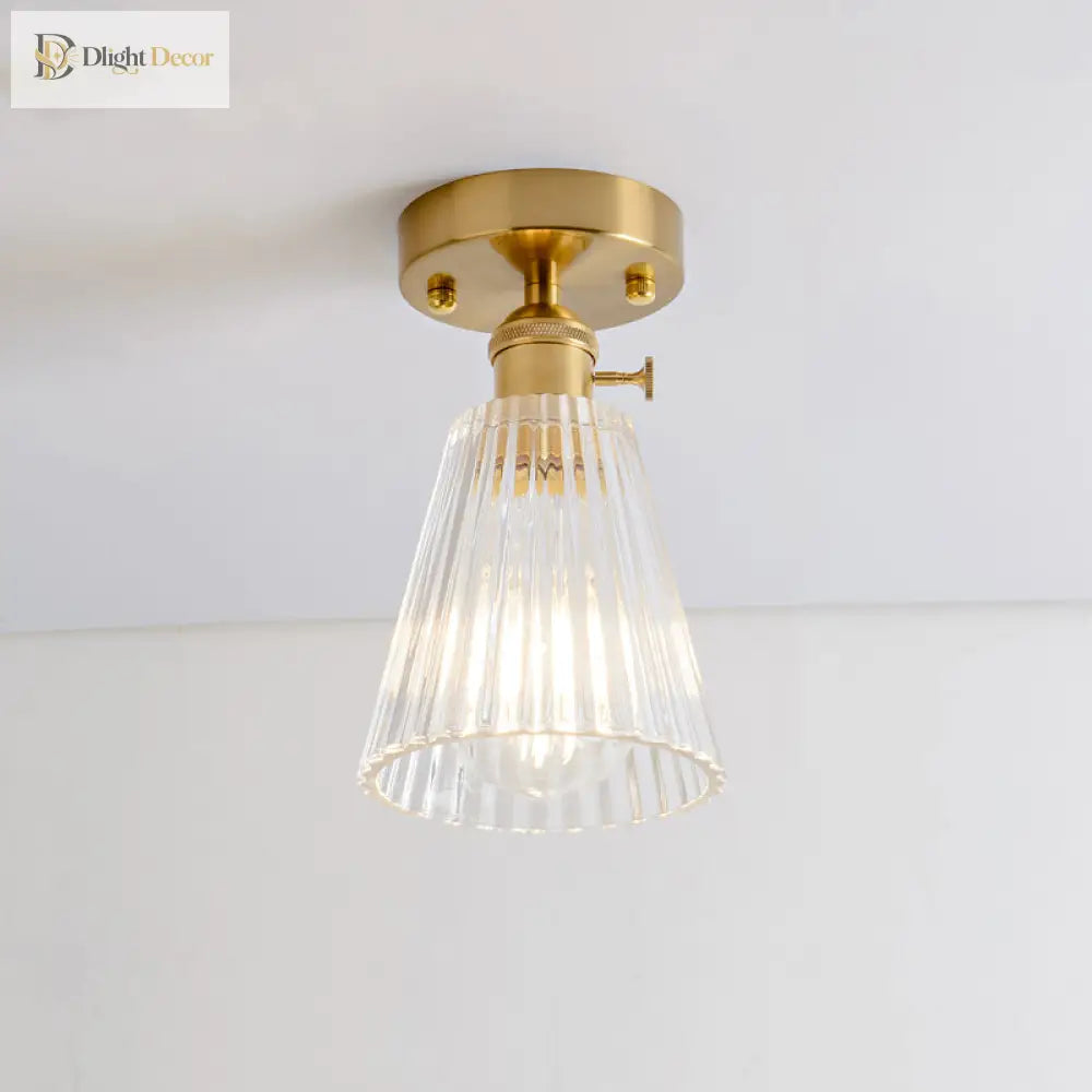 Industrial Chic Meets Modern Versatility: The Clear Glass Single - Light Gold Ceiling Light