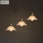 Illuminate Your Dining Room With Industrial Elegance: The 3 - Light Brass Cone Pendant Ribbed Glass