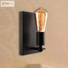 Industrial Charm For Your Dining Room: The Black Wall Lamp With Exposed Bulb