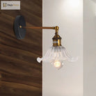 Industrial Elegance: Brass Cone Wall Sconce With Clear Ribbed Glass