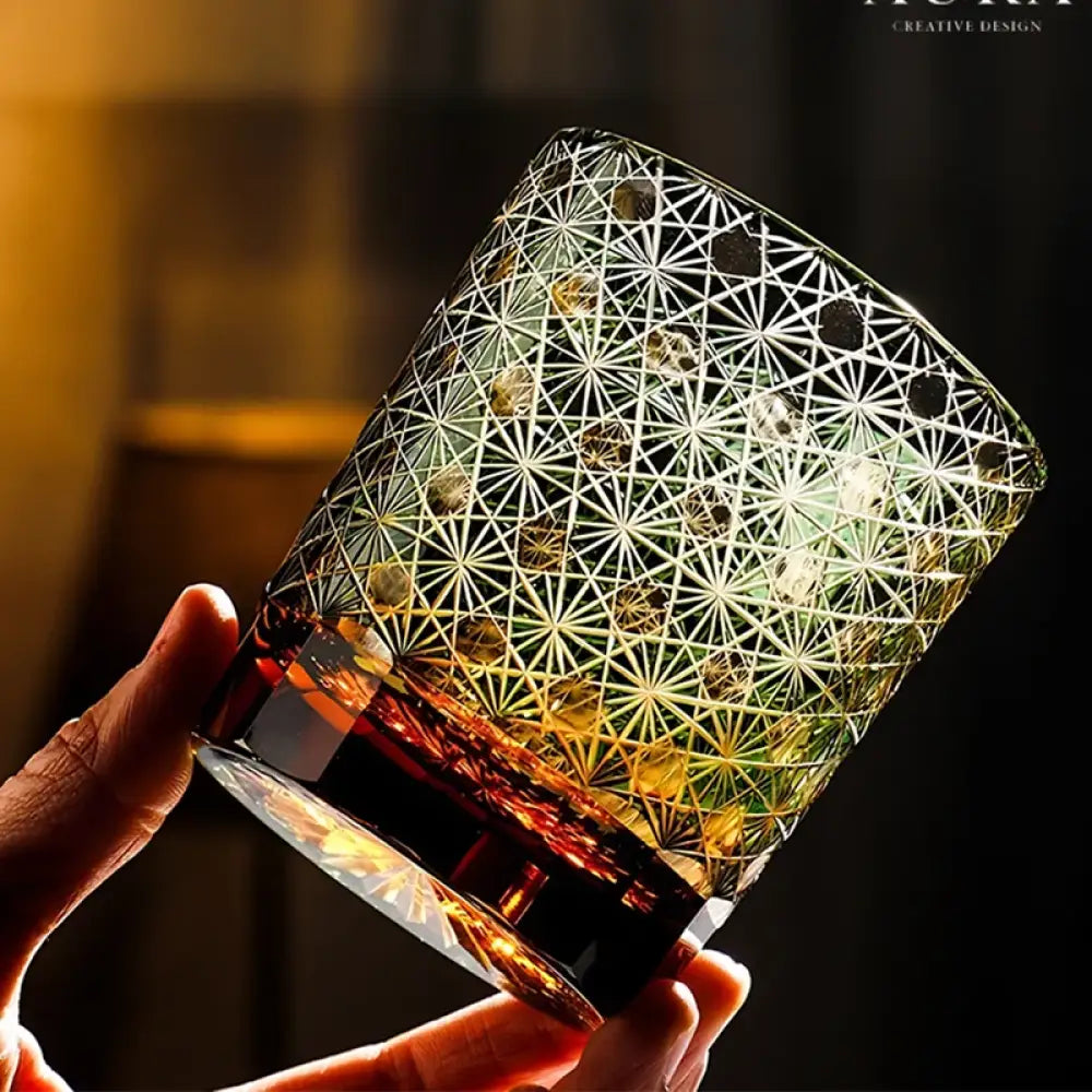 Amber green cut crystal whisky glass with geometric Edo Kiriko pattern