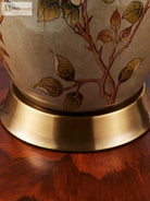 Bottom view of ceramic table lamp base with gold metal rim