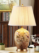 Floral ceramic LED table lamp with pleated fabric shade and gold base