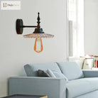 Light Up Your Space With Industrial Chic: The 1 - Light Black Sconce Clear/Green Glass