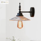 Light Up Your Space With Industrial Chic: The 1 - Light Black Sconce Clear/Green Glass