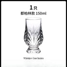 Clear faceted crystal whiskey tasting glass with bold diamond cuts and flared base