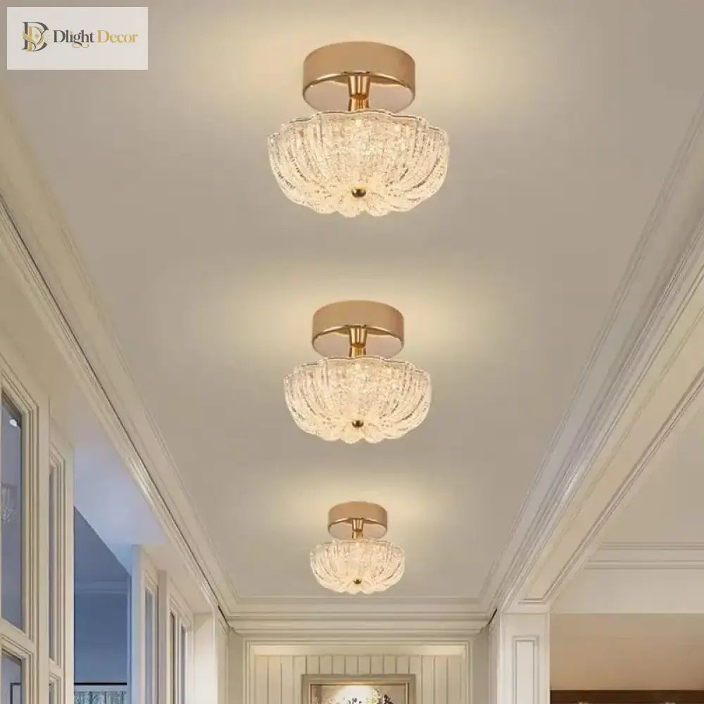 Gold flush-mount crystal acrylic ceiling light with three-tier drum shades