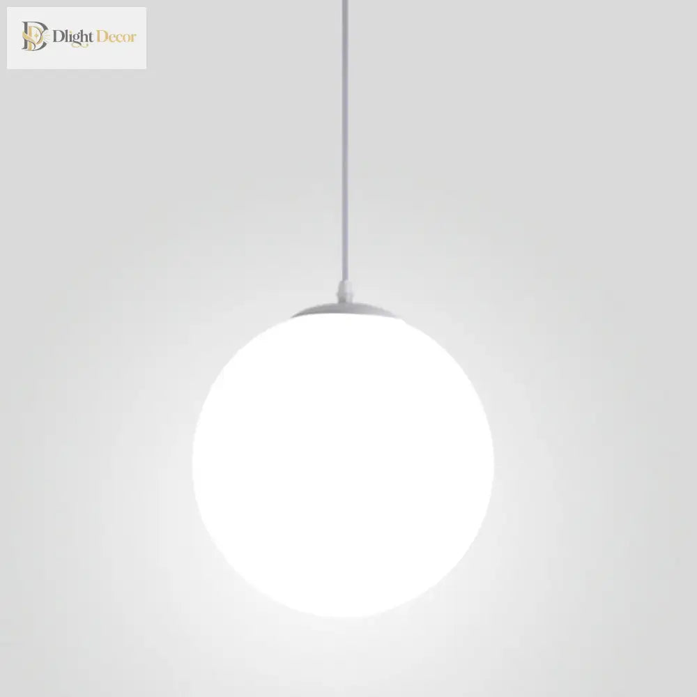 Makayla Elegance Meets Versatility: White Glass Globe Pendant