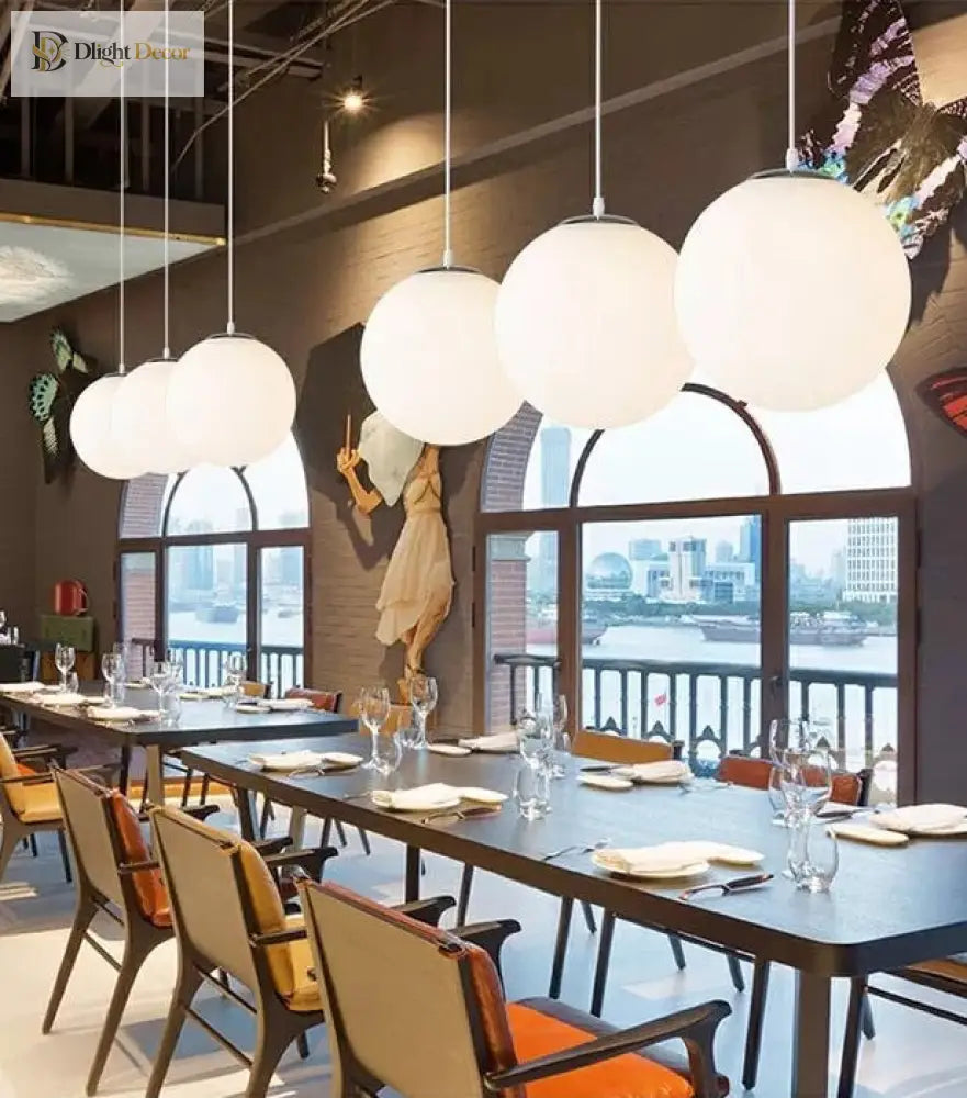 Makayla Elegance Meets Versatility: White Glass Globe Pendant