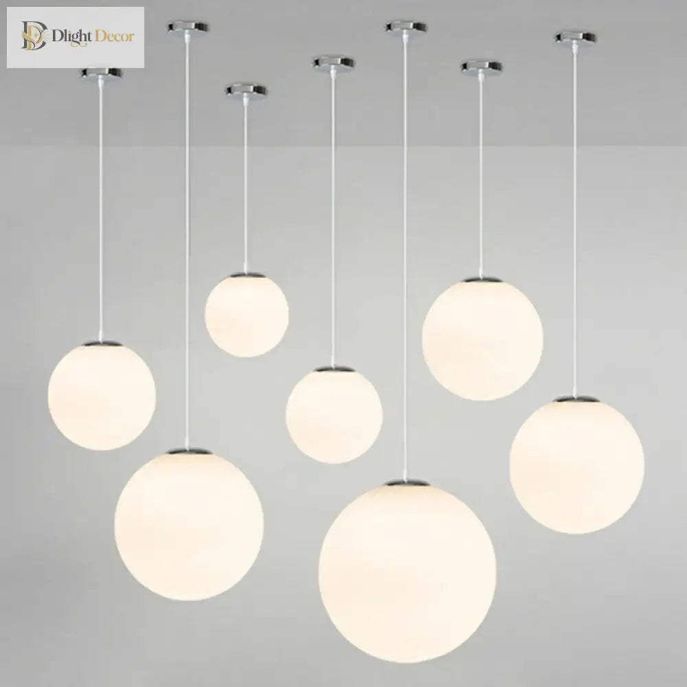 Makayla Elegance Meets Versatility: White Glass Globe Pendant