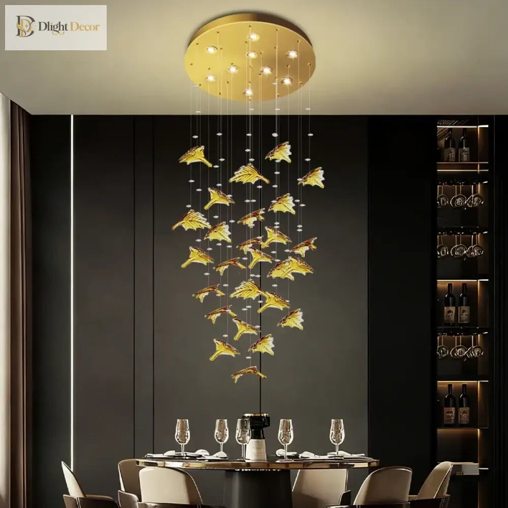Gold ceiling canopy pendant chandelier with warm lights and hanging gold leaf glass pieces