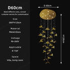 Small round-canopy pendant chandelier with warm bulbs, clear cords, and gold leaf glass pieces